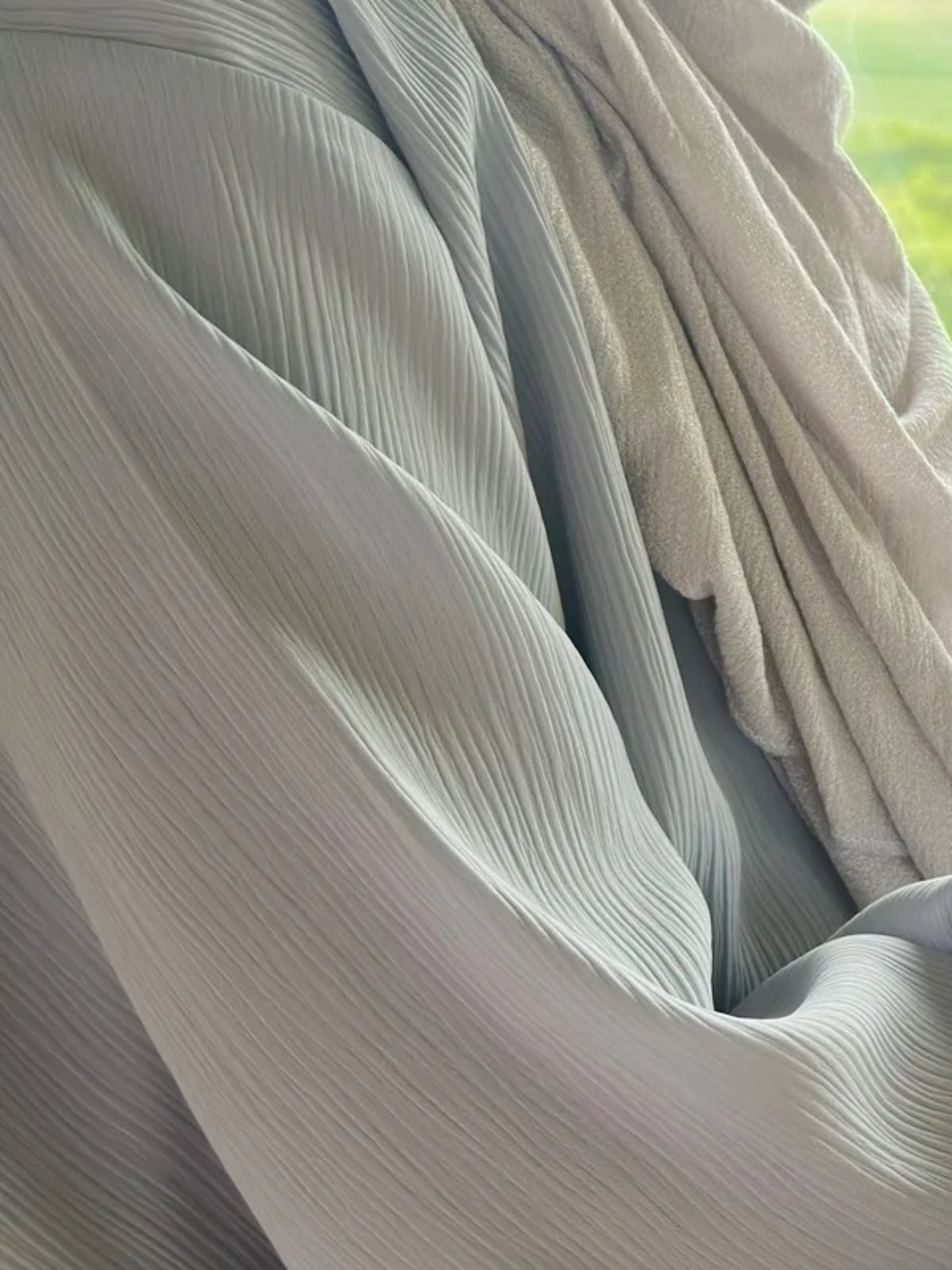 Close-up of Frozen Abaya premium crinkle fabric texture - wrinkle resistant Korean modest wear