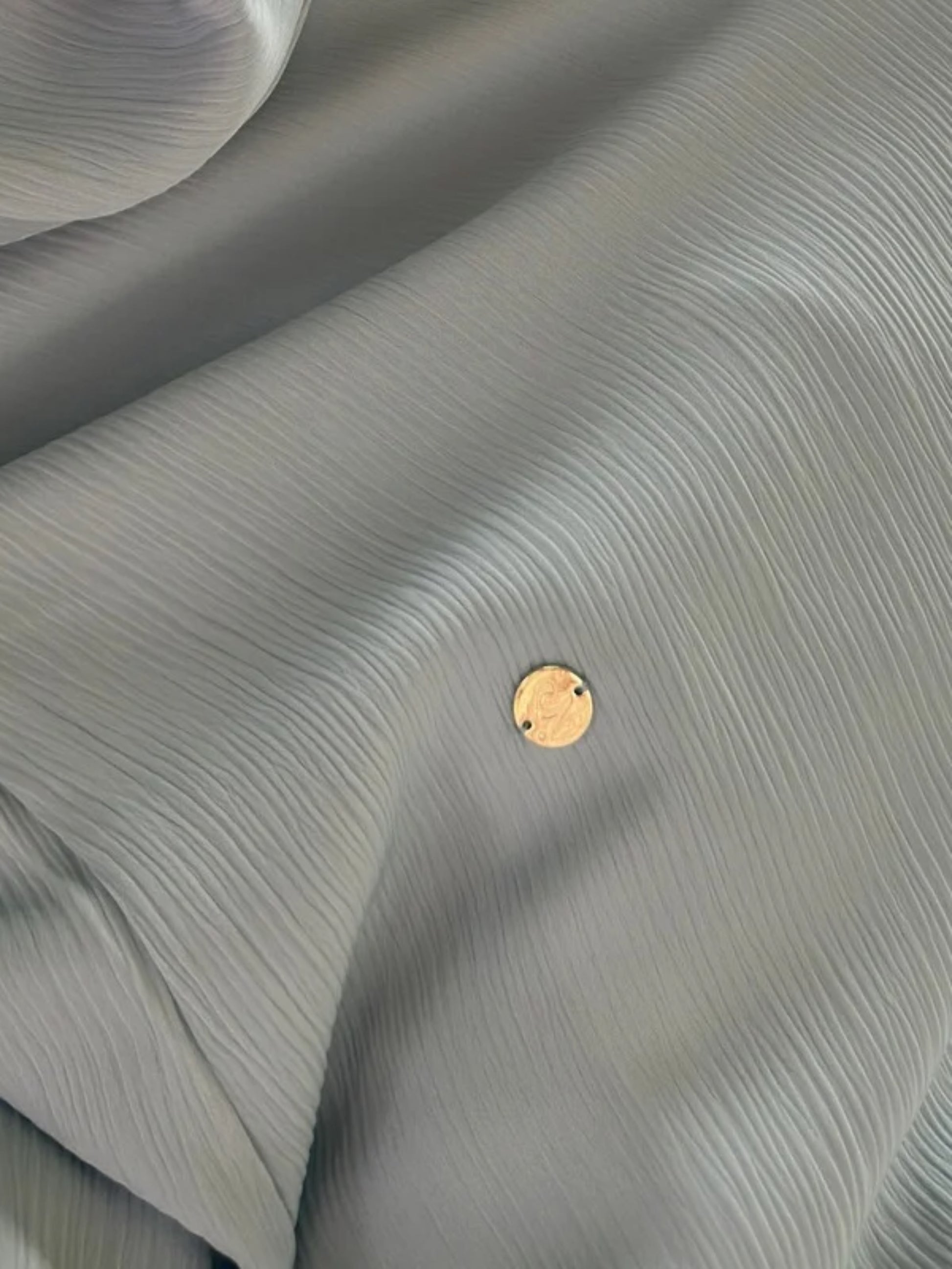 Close-up of Frozen Abaya premium crinkle fabric texture - wrinkle resistant Korean modest wear