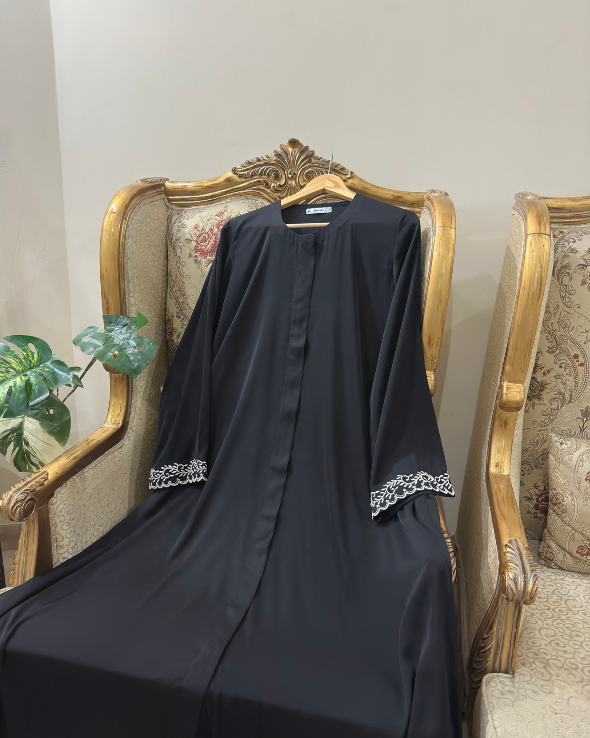 Luxurious black abaya with side pockets - lightweight silk-like modest wear for everyday elegance