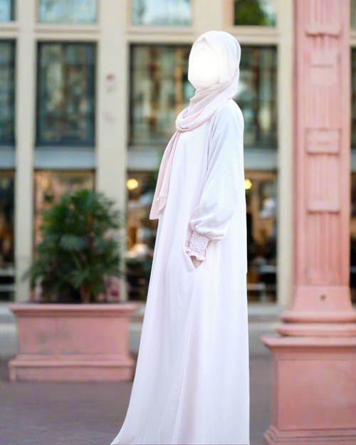 Light pink modest abaya with elastic sleeves and pockets - everyday modest wear for Muslim women USA